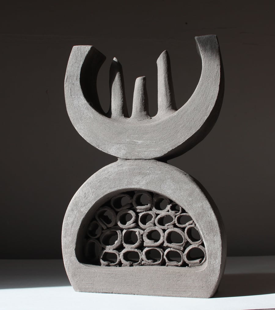 Black Clay Sculpture Interacting Forms