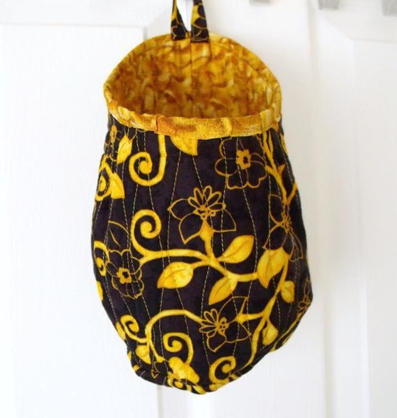 quilted door handle storage bag, storage pod, black and gold