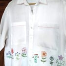 Hand embroidered white linen blouse