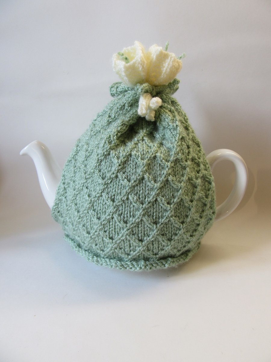 Tea cosy tea cosie - knitted pastel green with crocus flowers