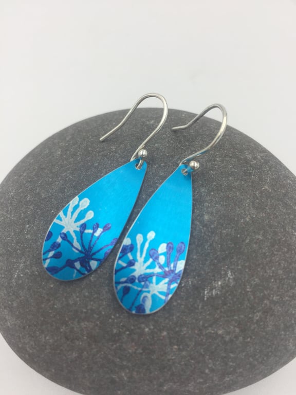 Turquoise blue aluminium cow parsley drop earrings.