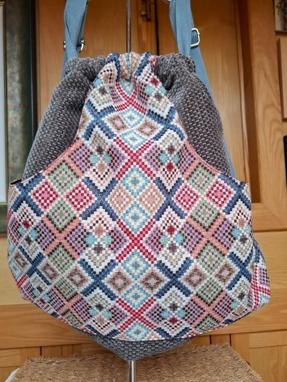 Velvet and tapestry drawstring backpack