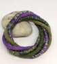 Felted cord bracelet in shades of purple and olives