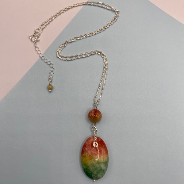 Watermelon solar quartz oval pendant with silver plated spiral