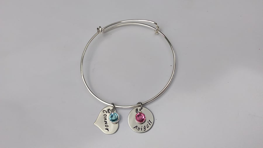 Hand Stamped personalised adjustable bracelet with name and birthdate charms