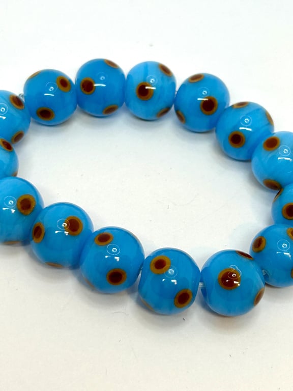 Handmade bracelet with handmade blue and brown lampwork glass beads