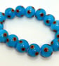 Handmade bracelet with handmade blue and brown lampwork glass beads - Image 1