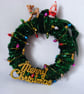 Handmade santa and reindeer christmas wreath.