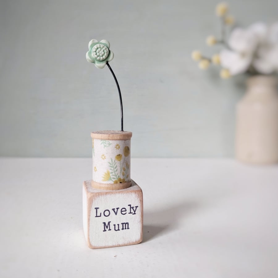 Clay Flower on a Teeny Vintage Bobbin 'Lovely Mum'
