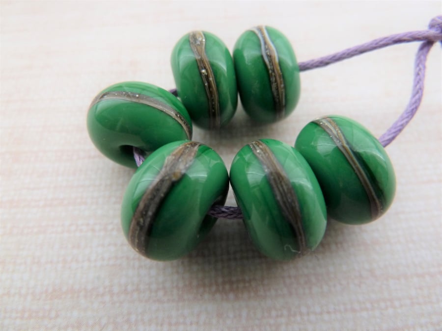 green wrapped lampwork glass beads