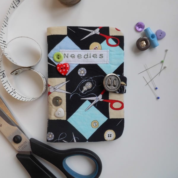 Sewing needle case in sewing-themed fabric