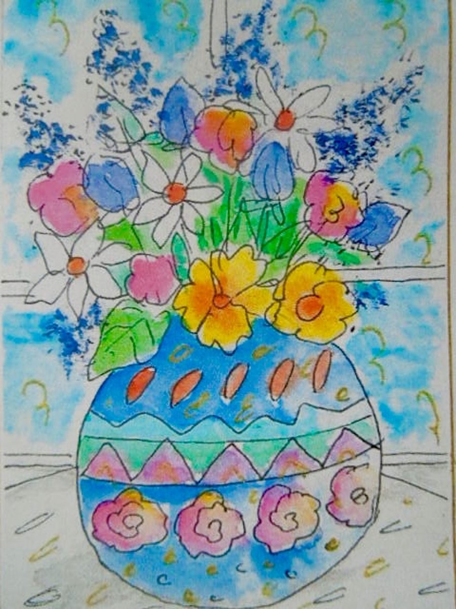 Handmade birthday greetings card with envelope.