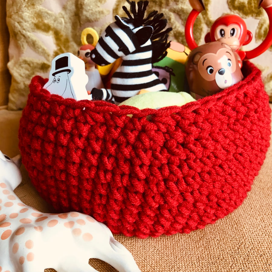 Bold red crocheted bowl for nursery or storage