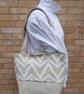 Large cream and white tote bag. 