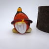 small glass gnome