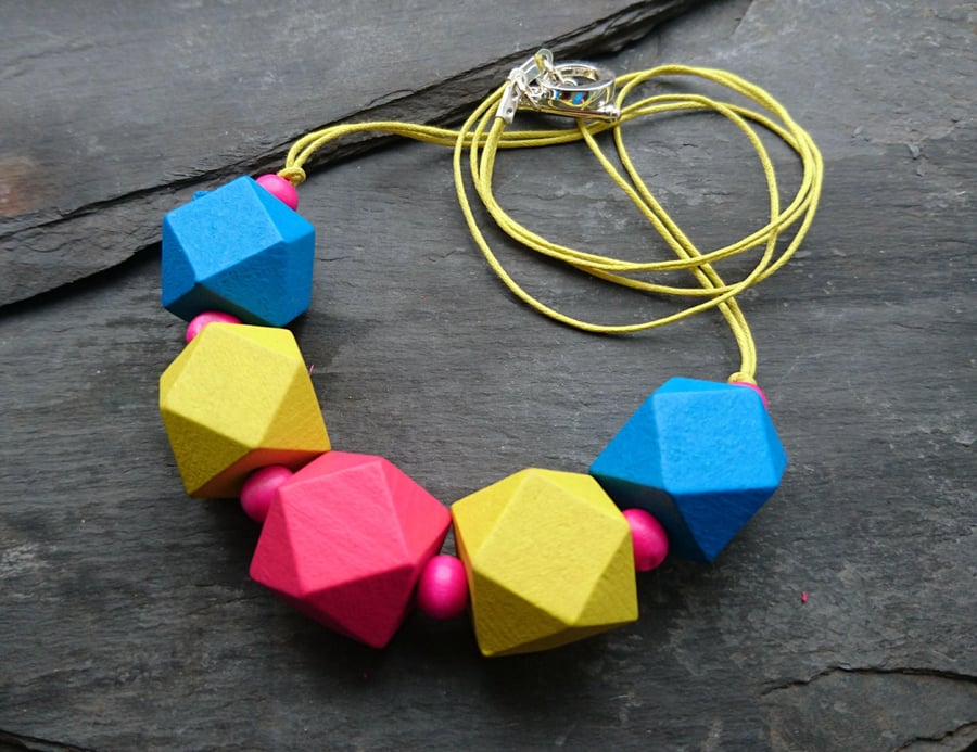 Bright pink, blue and yellow chunky geometric wooden necklace
