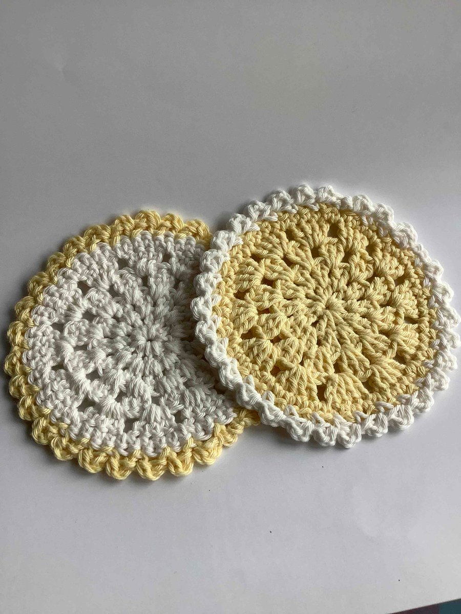 2 pretty crocheted coasters 