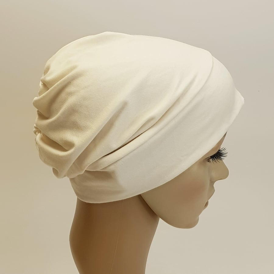 Cream coloured chemo hat alopecia hair loss stretchy beanie surgical scrub cap