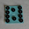15MM BLACK ROUND BUTTONS WITH TWO HOLES FOR ATTACHING 