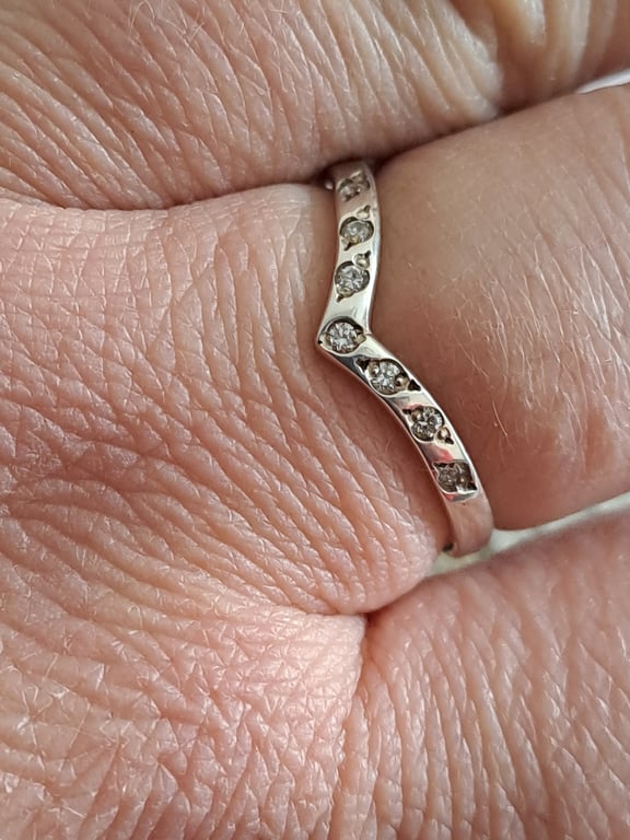 Wishbone ring in 9ct white gold with seven bead set diamonds 