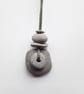 Layered Pebble Pendant with Metal Bead - Image 4
