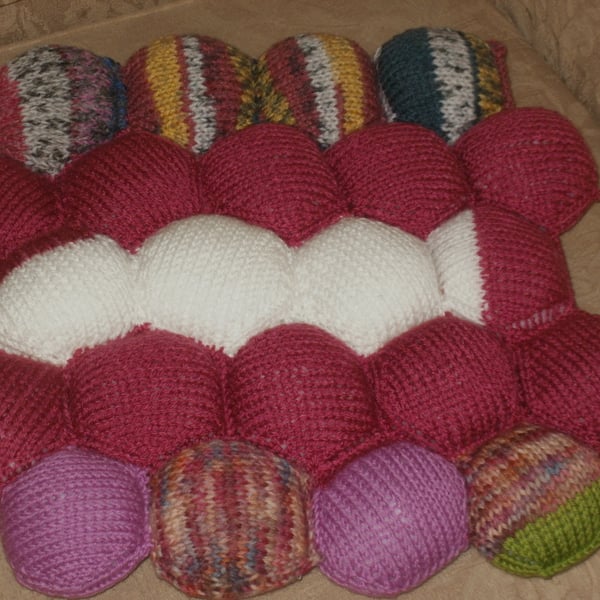 Patchwork stuffed cushion