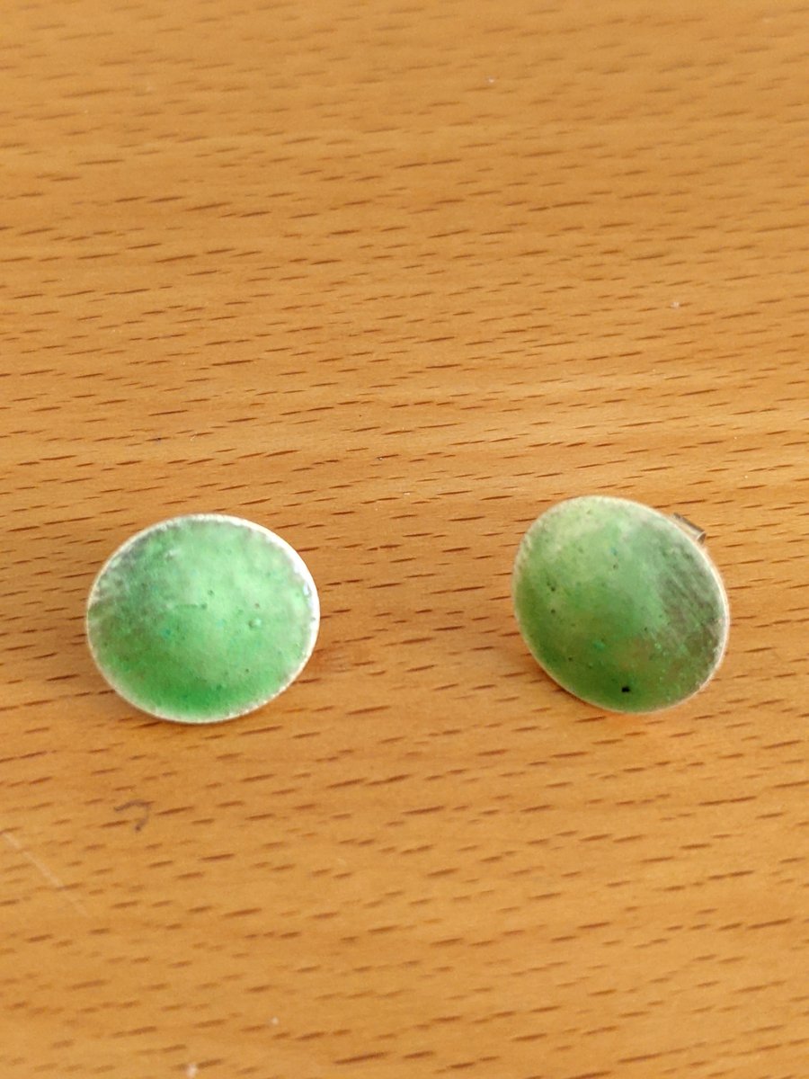 handmade fine silver stud earrings with transparent green enamel 