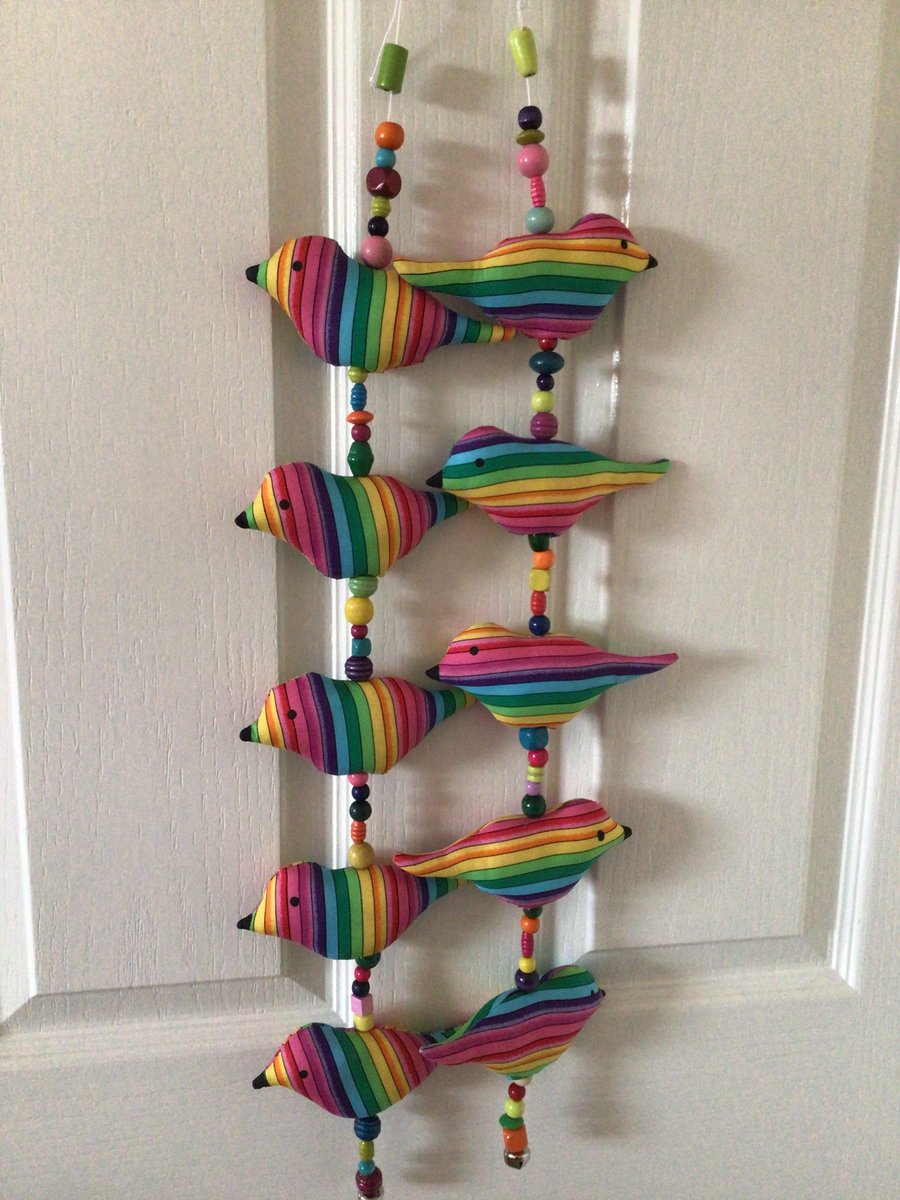 Bird hanging decoration. Rainbow.