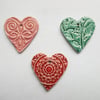 Set of three ceramic heart pendants