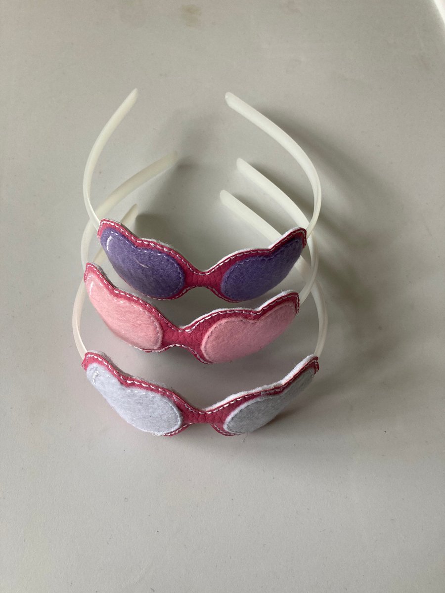889. Heart shades hairband.