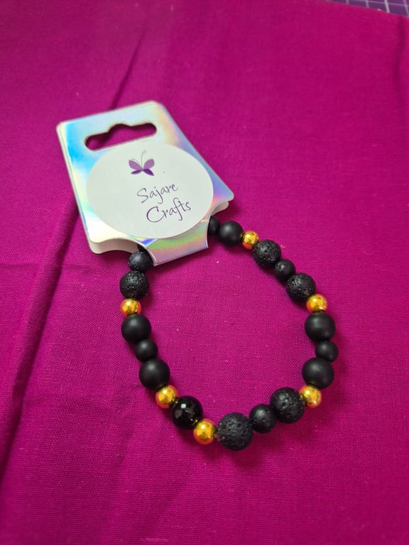Black & Gold Lava Stone Bracelet — Handcrafted Stretch Design  