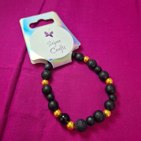 Black & Gold Lava Stone Bracelet — Handcrafted Stretch Design  