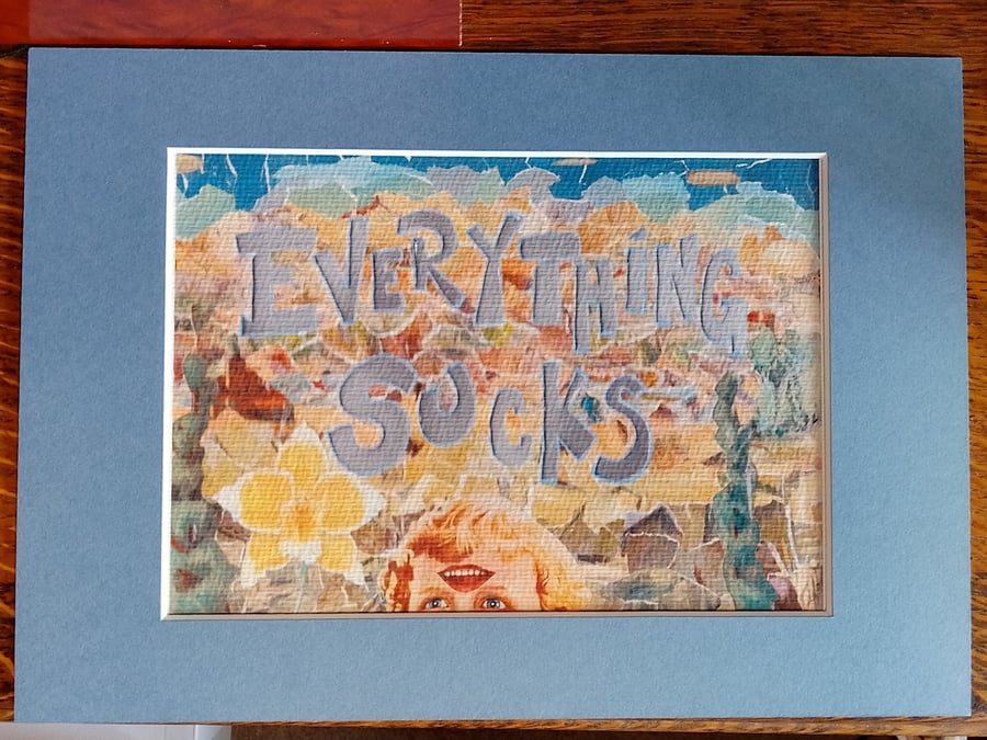 Print of collage "Everything Sucks", unframed, in blue mount
