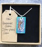 Handmade Ceramic Otter pendant in turquoise blue - Image 6