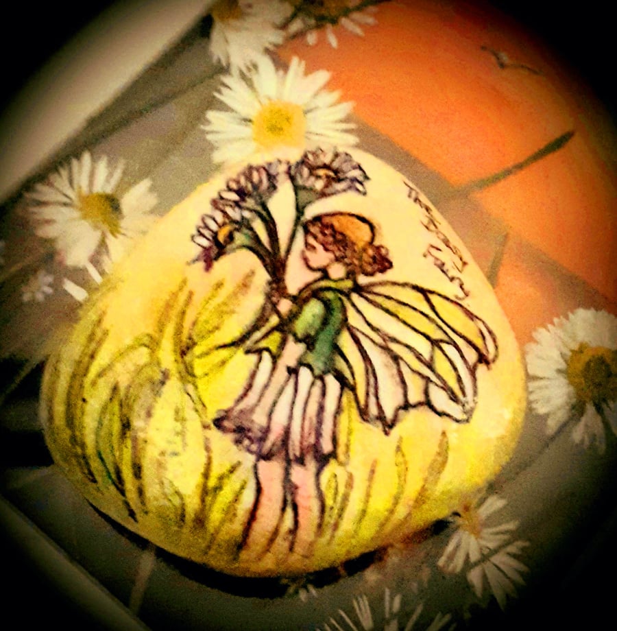 Hand painted "The Daisy Fairy" beach rock 