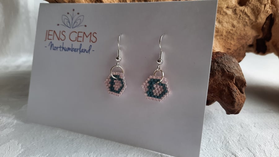 A Pair of Letter "D" Beadwork Earrings