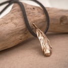 Small solid bronze feather and faux suede necklace