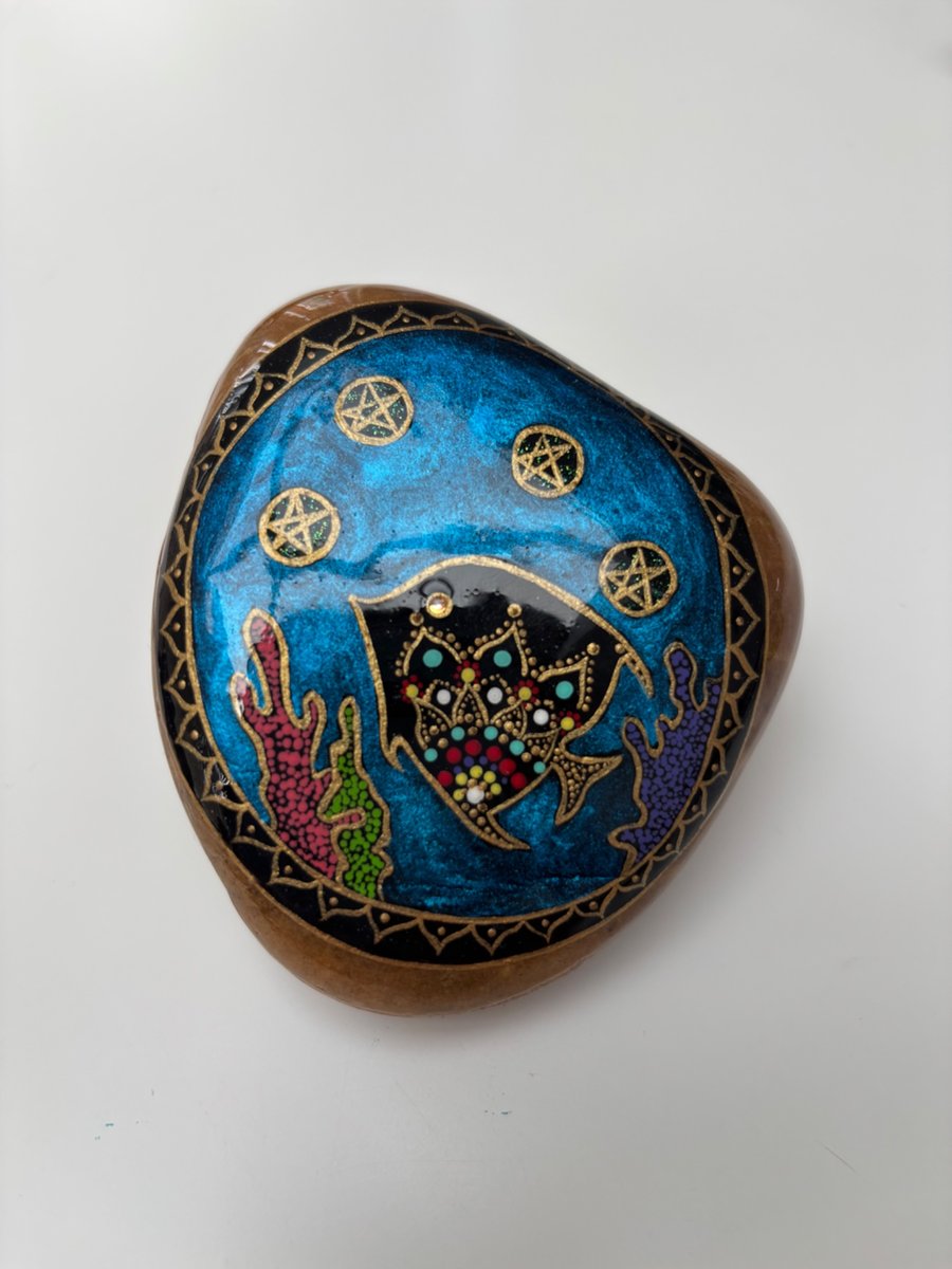 Hand painted fish on natural rock