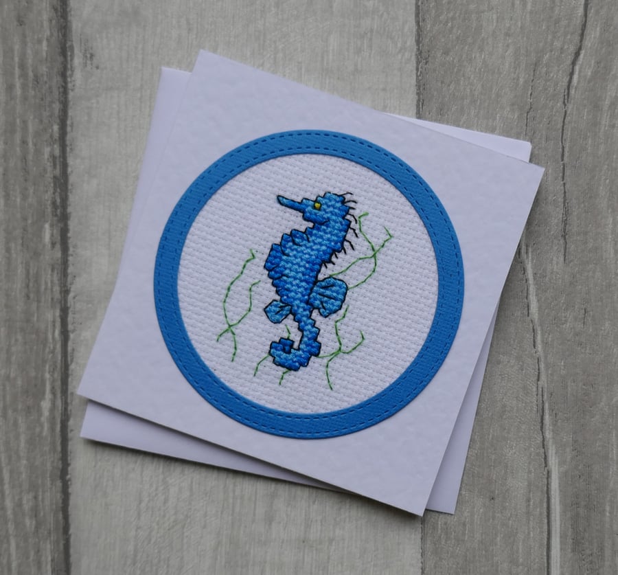 Cross Stitch Blue Seahorse with Weeds - Blank Greetings Card