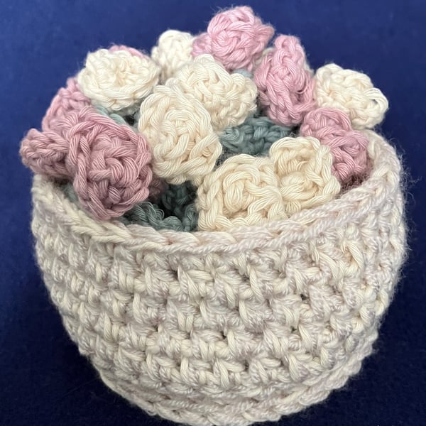 Set of four Rose flower drinking glass or mug coasters in a cream basket