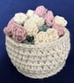 Set of four Rose flower drinking glass or mug coasters in a cream basket - Image 1