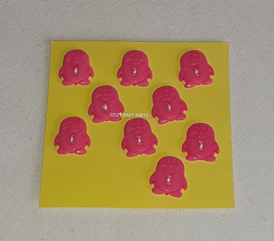 CERISE PENGUIN SHAPED BUTTONS WITH TWO HOLES FOR ATTACHING 
