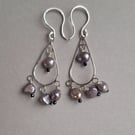 Boho style silver earrings with natural pearls and black tourmaline.