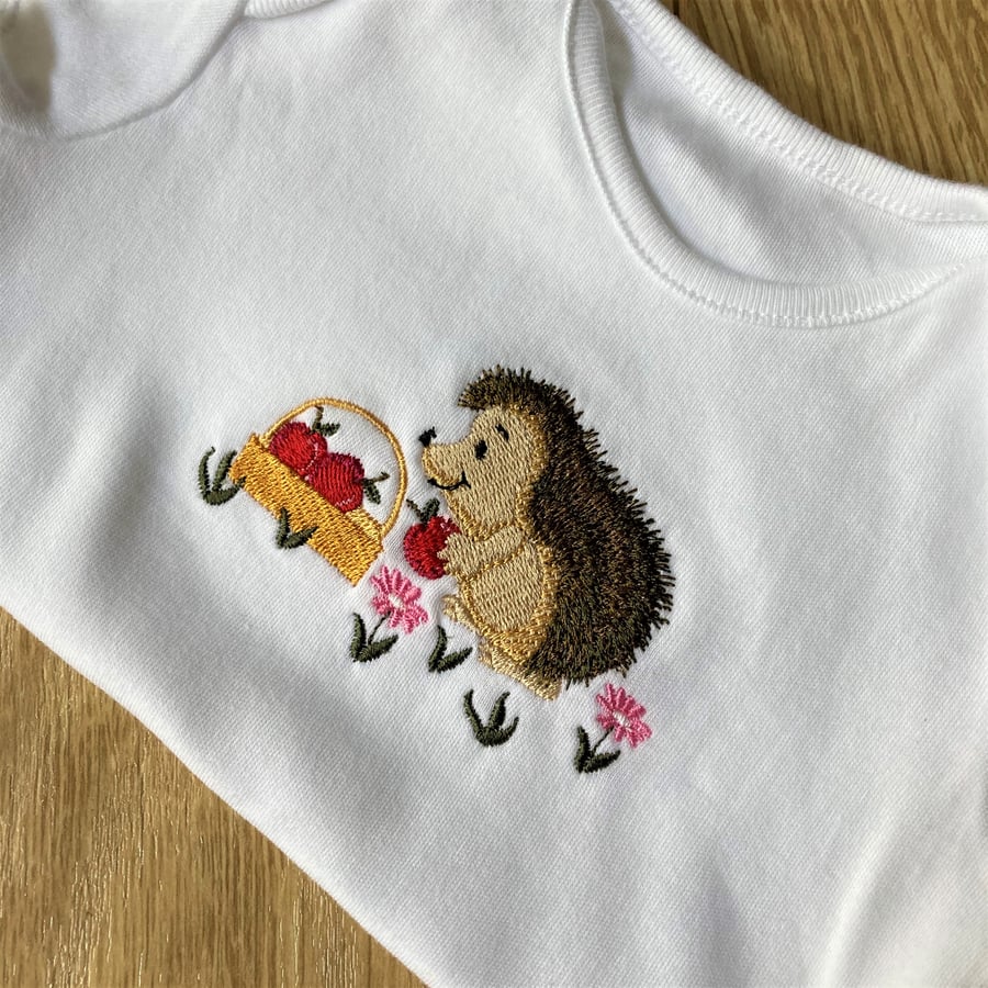 Baby body suit 6 - 9 months with embroidered hedgehog design