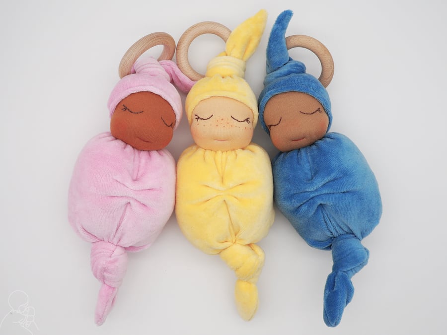Snuggly cuddly baby doll with teething ring