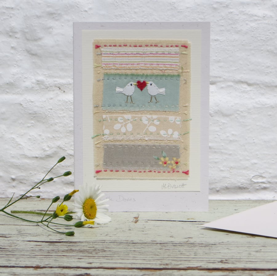 Hand-stitched card with doves and heart