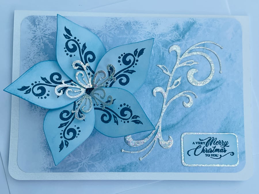 Luxury Ice blue spinning poinsettia Merry Christmas card