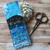 Embroidered seascape bookmark.