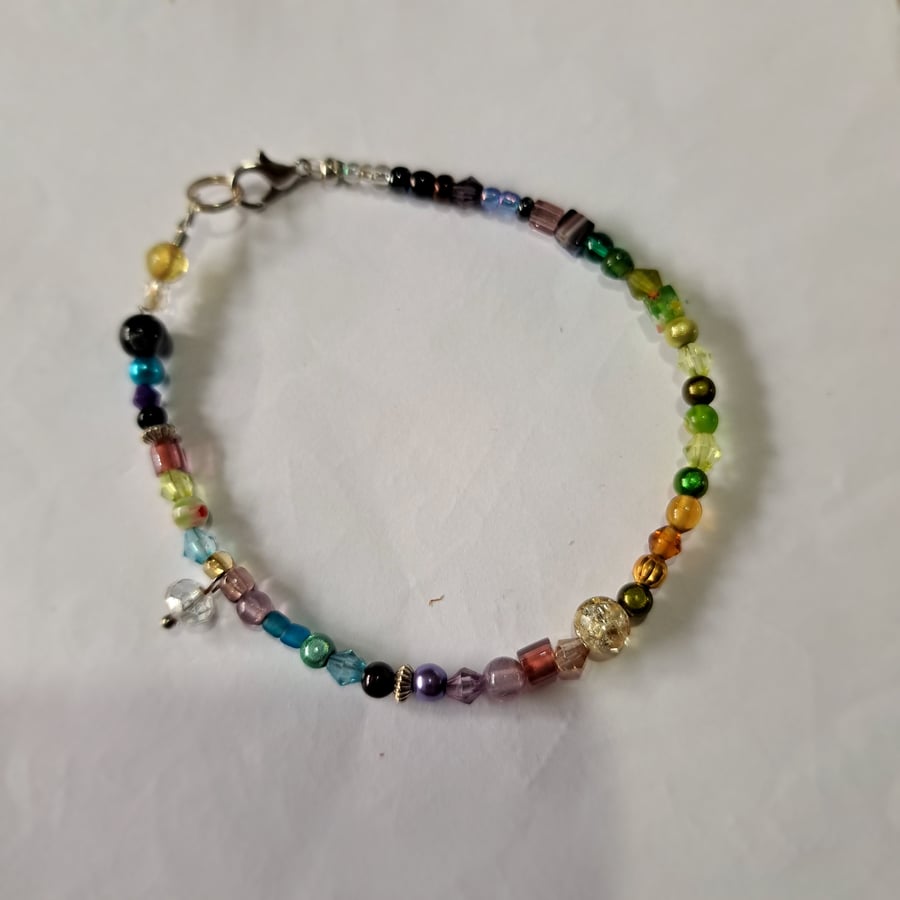 Multicoloured beaded bracelet, silver plated clasp
