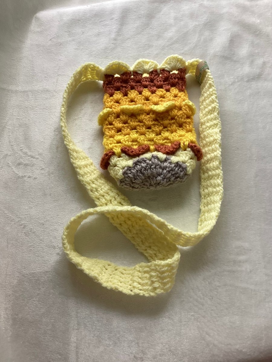 Crochet bag, water bottle holder, small bag.